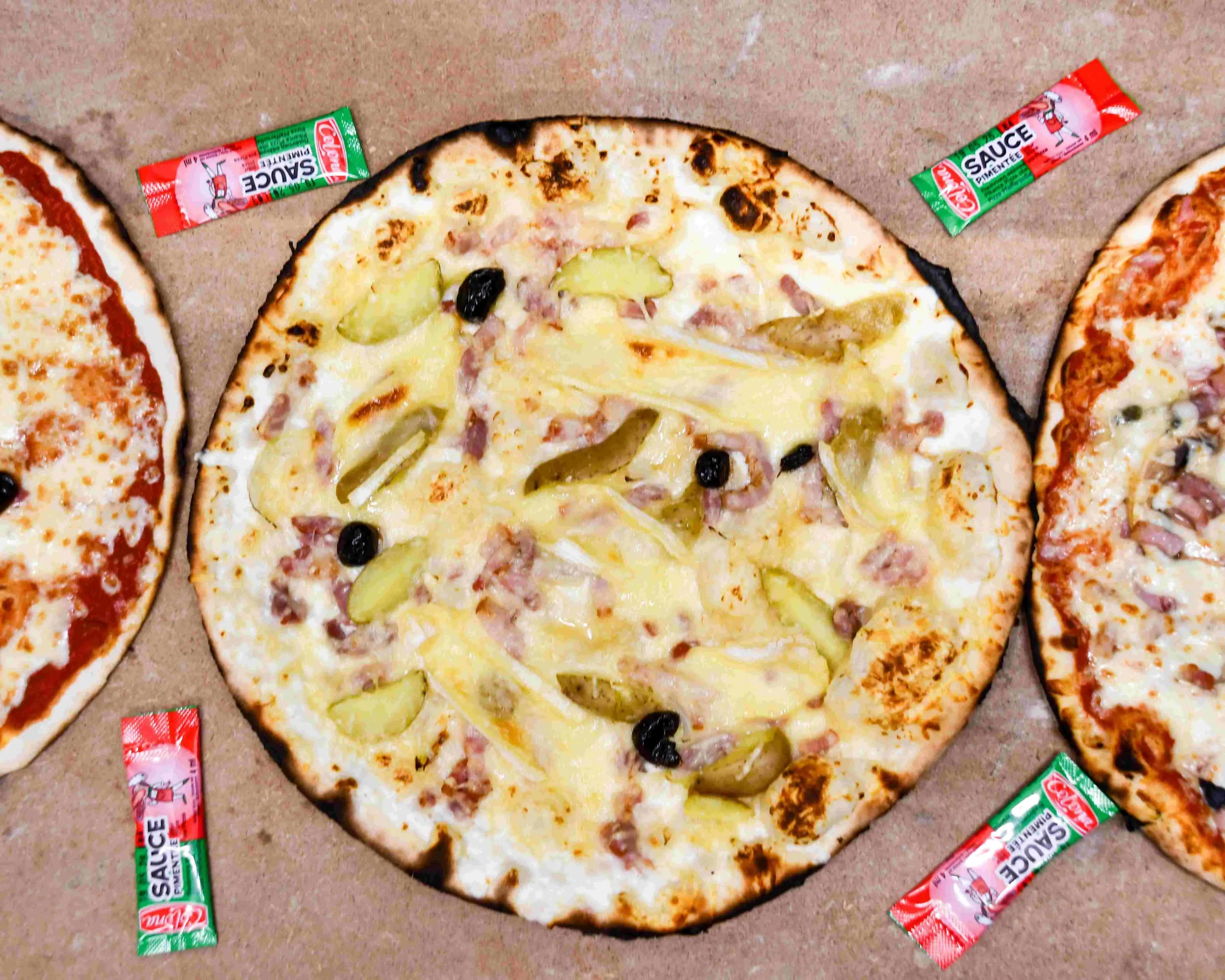 Assortiment de pizzas artisanales Popille Pizza cuites au feu de bois